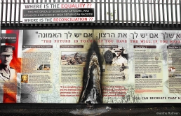 A vandalized Belfast poster showing historic links between Ulster Loyalists and Israel