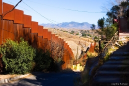 A rusting fence marks the border between Mexico and the US in the divided city of Nogales